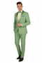 Mint green 2-piece men's tuxedo. Fitted jacket with peak lapels, single button. Slim-fit trousers. Smooth fabric, light shirt. Matching bow tie. Blue patterned pocket square. Soft, cohesive mint green look.