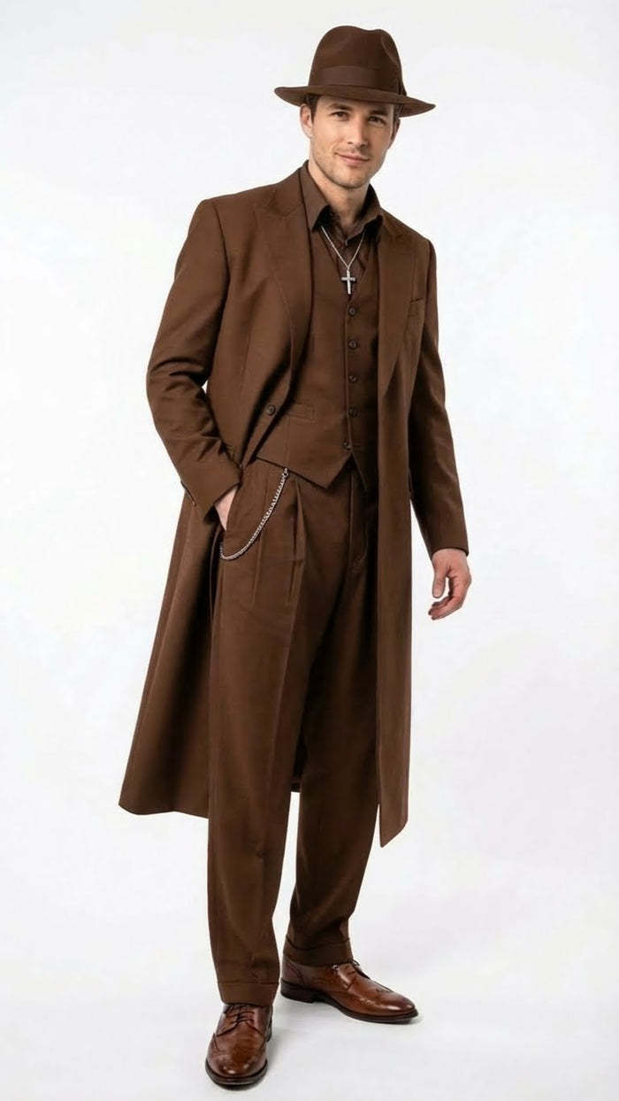 Men's 1920s brown zoot suit by Alberto Nardoni: long coat, vest, & wide-leg trousers. Solid brown, slight sheen. Fitted coat, back vent. Vest with 3 buttons, paired with brown shirt. High-waisted trousers. Accessories: brown hat, chain. Polished brown leather lace-up shoes.