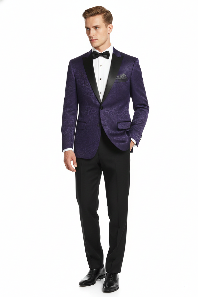 Men's purple paisley tuxedo jacket. Fitted silhouette, black satin shawl lapels. Textured paisley pattern in purple shades. Single-button closure, discreet pocket square.
