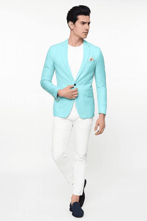 Men's slim fit aqua blazer. Light, smooth fabric with floral lining. Single-button closure, notched lapels, two pockets. Tailored cut in light turquoise. Long, slim sleeves.
