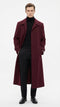Alberto Nardoni men's burgundy overcoat. Full-length, straight cut with a smooth fabric. Double-breasted with notched collar and side pockets. Ankle-length, button sleeves, streamlined silhouette.
