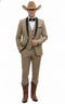 Tan three-piece cowboy suit: fitted blazer with black lapel, matching vest, beige pants. Brown leather cowboy boots with decorative stitching.

