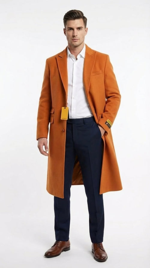 Alberto Nardoni men's orange rust wool blend overcoat. Tailored single-breasted design, notched lapels. Features chest/side pockets, back vent, buttoned cuffs. Knee-length for a formal look.

