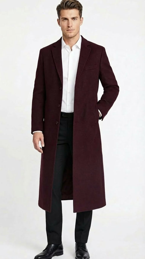 Men's burgundy long coat. Classic fit, wool blend. Straight silhouette, front buttons, and chest pocket. Tailored look.
