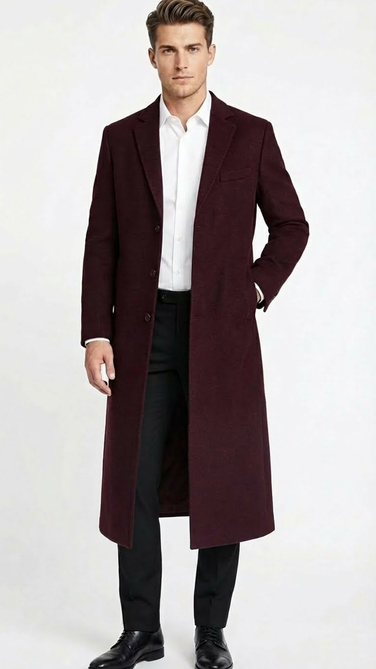 Men's burgundy long coat. Classic fit, wool blend. Straight silhouette, front buttons, and chest pocket. Tailored look.
