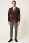Men's burgundy & black paisley tuxedo blazer. Tailored fit, single-button, notched lapels, front pockets. Intricate paisley pattern. Long sleeves, buttoned cuffs, smooth lining.
