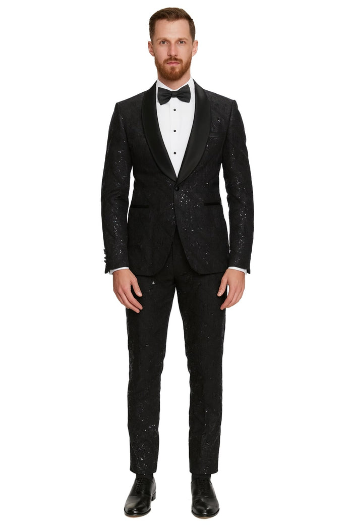 Black sequin tuxedo suit with a fitted silhouette, satin shawl lapel, and tailored pants. Includes a white dress shirt and black bow tie for a complete look.
