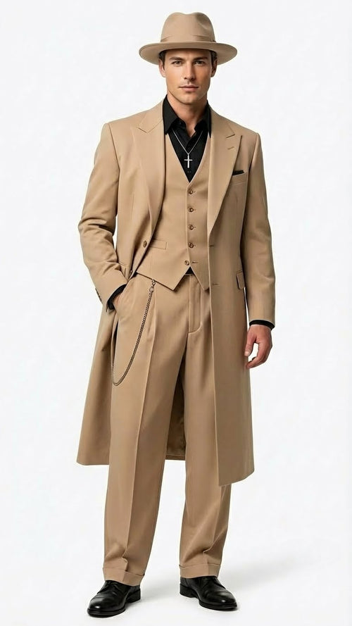 Men's 1920s beige zoot suit: long, boxy coat, double-breasted vest, loose trousers. Smooth, light beige fabric. Broad lapels, chain detail, black shirt, and a matching fedora complete the look.