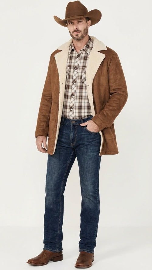 Men's brown western faux suede blazer features a tailored shape with a notched collar and soft, textured fabric. The blazer has a lighter, contrasting faux fur lining and a single closure.