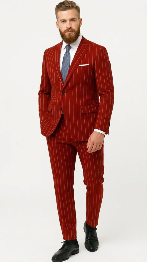 Men's red pinstripe suit. Two-button jacket with vest, vibrant red fabric, white stripes. Includes matching trousers. Classic style.
