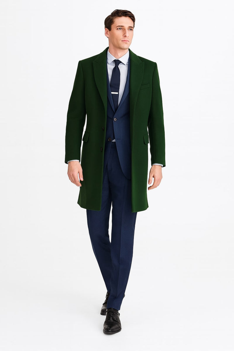 Men's dark green wool overcoat. Classic long design, structured silhouette. Straight cut, notch lapel. Textured wool fabric. Two front pockets, single button closure. Upper thigh length. Formal style.
