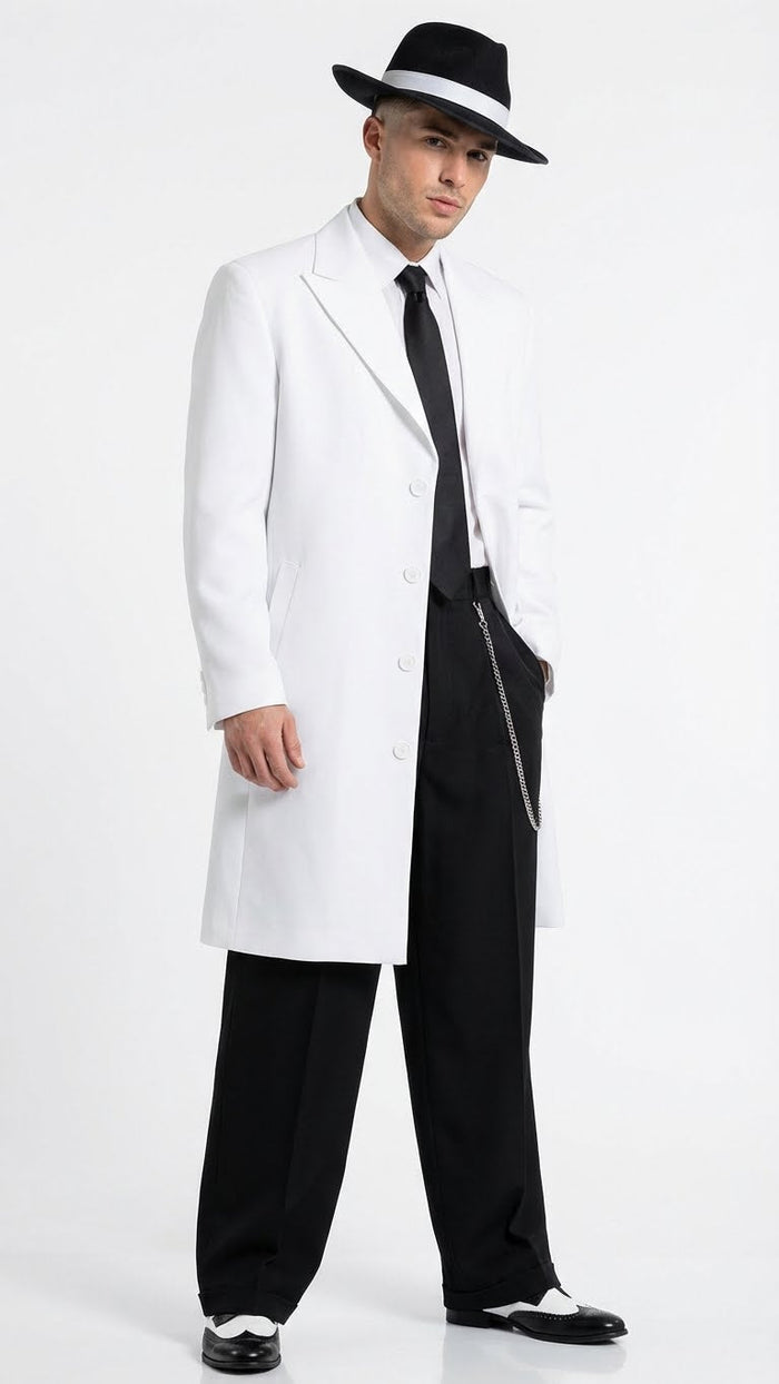 Men’s white zoot suit gangster style outfit features a long white jacket with a pointed collar, paired with black trousers. The ensemble includes a black tie and shoes, plus a black hat with a silver ribbon.