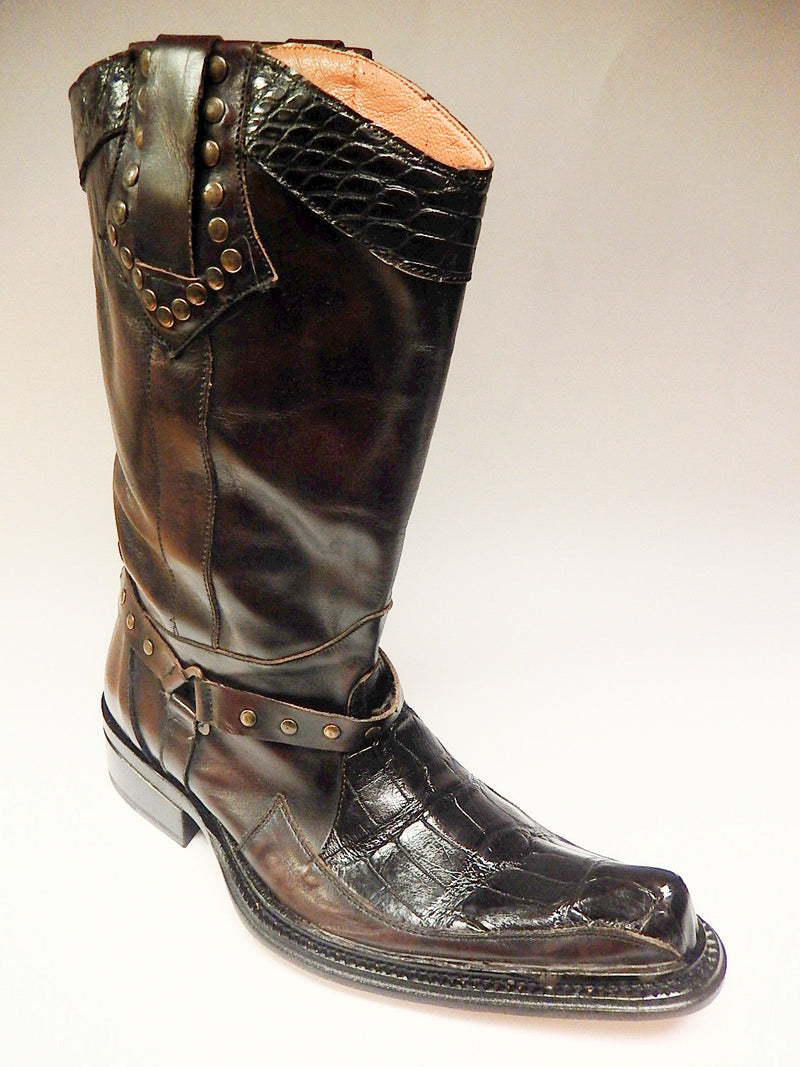 Dark brown leather Mauri knee boots (44238) with textured black alligator accents. Pointed toe, decorative strap, and metal stud details. Flat sole with a slight heel.