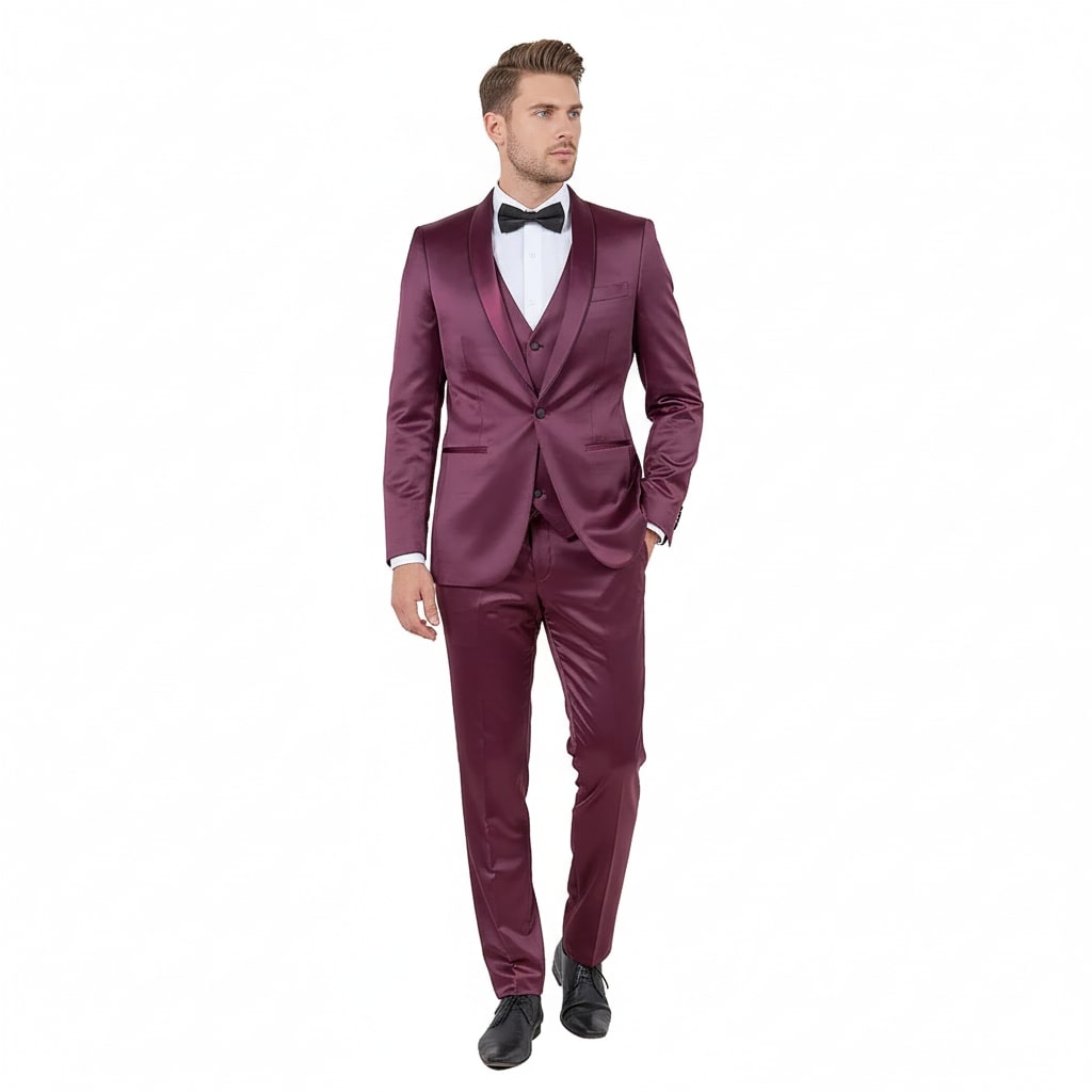 Men's burgundy slim-fit tuxedo with a shiny sateen finish. Satin shawl lapel, single-breasted, two-button jacket, and matching slim pants. Glossy and smooth material.

