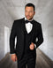 Black men's tuxedo with shawl lapel and satin trim. Features a three-button vest, side pockets, and a fitted silhouette. Long sleeves and button closure.
