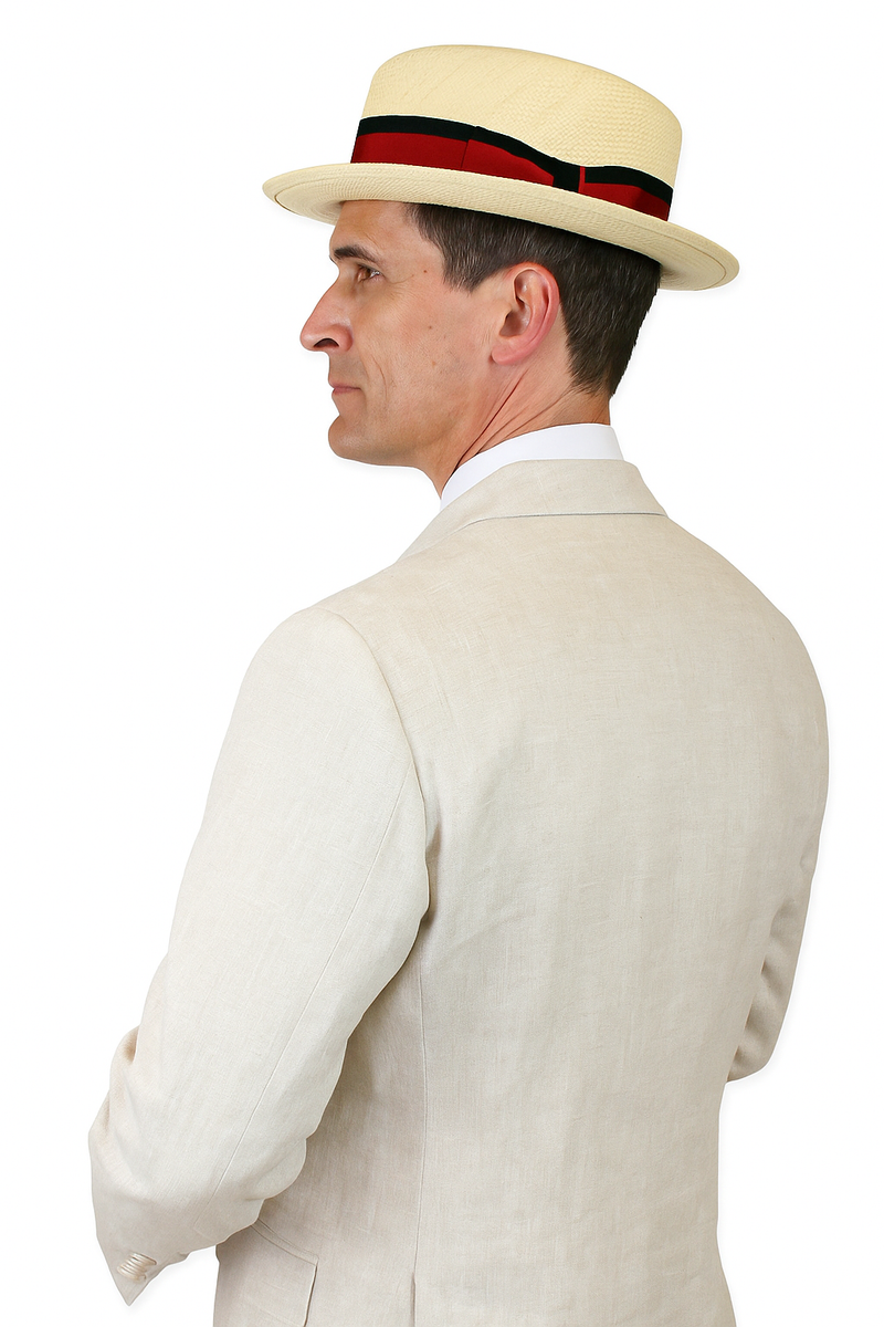 Riverdale linen coat in natural beige. Classic three-piece design with tailored cut, structured shoulders, and single back vent. Features long sleeves with buttoned cuffs. Lightweight, textured linen, perfect for summer.
