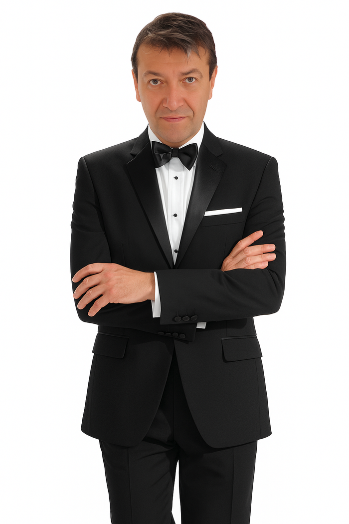 Mantoni 140s black wool tuxedo. Single-button closure, streamlined fit. Includes white dress shirt, black bow tie, white pocket square. Features two front flap pockets, structured shoulders.