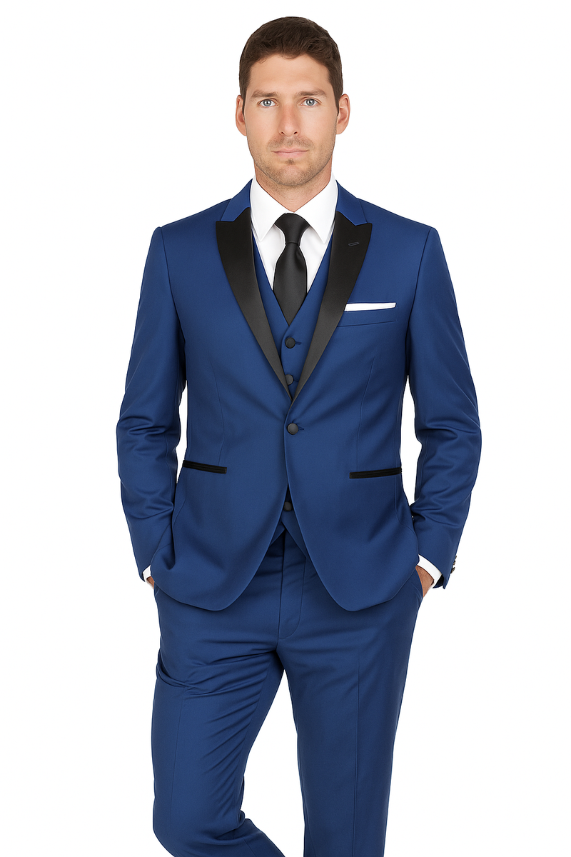 Two-piece blue tuxedo. Modern slim-fit jacket with black satin lapel and matching trousers. Includes a light blue pocket square. Stylish and refined.
