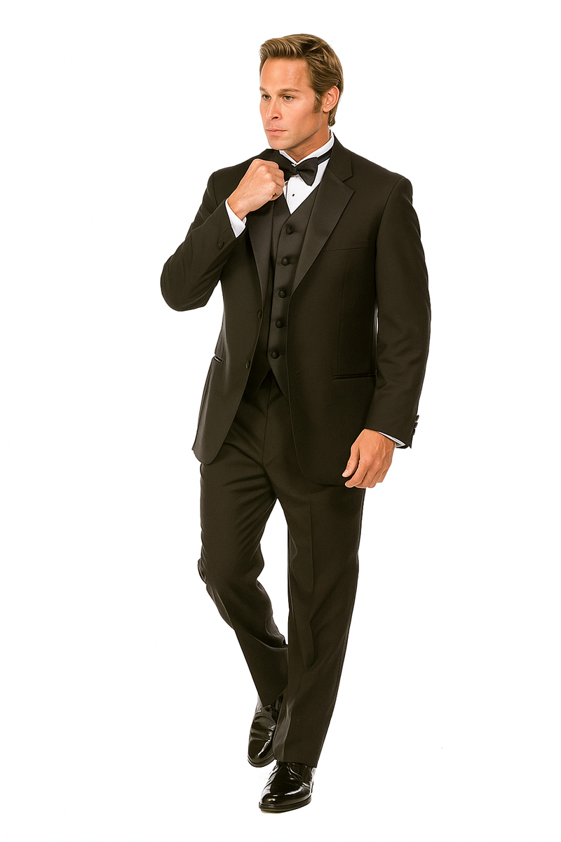 Classic black two-button tuxedo with a structured lapel. Smooth fabric, tailored straight-leg pants. Styled with a white shirt, bow tie, and a five-button vest for a formal, sleek look.
