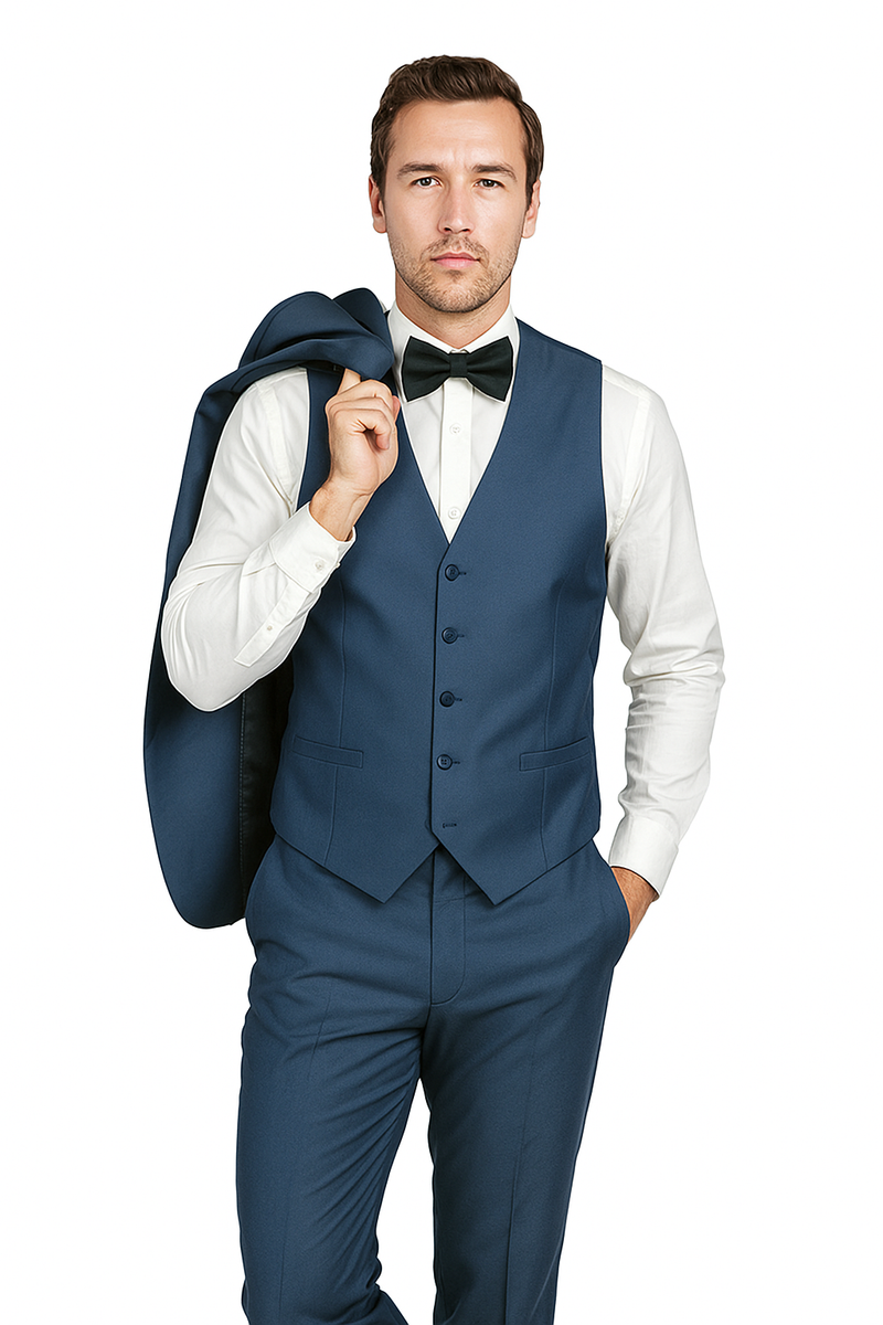 Deep blue tuxedo with a fitted, five-button vest. Smooth finish, clean lines, and tailored fit. White shirt visible under the jacket, showcasing a structured and sleek ensemble.

