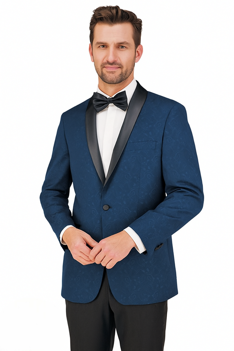Giorgio Fiorelli's paisley tuxedo: burgundy, gray, blue. Fitted design with shawl lapel (satin finish), subtle paisley, single button. Includes side pocket, tailored sleeves. White shirt visible.
