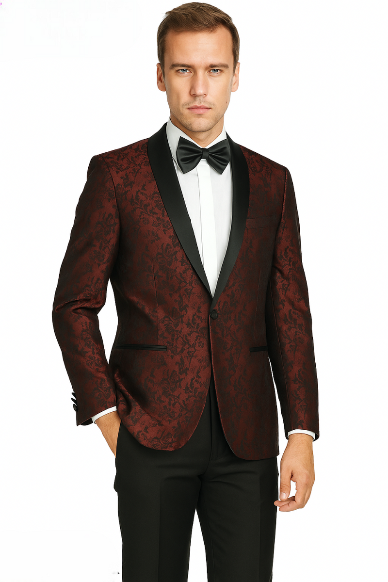 Burgundy jacquard tuxedo with gray floral pattern, black shawl lapel, and single-button closure. Tailored sleeves and structured back. Paired with black trousers for a coordinated ensemble.
