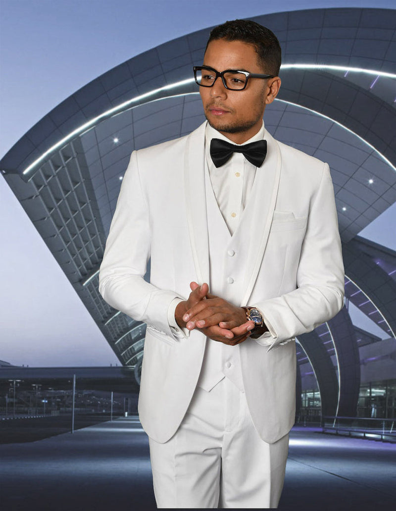 Men's white tuxedo with shawl lapel and satin trim. Includes jacket with long sleeves, matching vest, and trousers. Fitted, elegant design.

