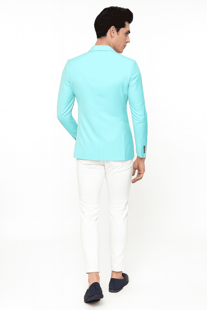Men's aqua slim-fit blazer with single-button closure & floral lining. Light turquoise color, notched lapel, long sleeves. Smooth finish, tailored silhouette, structured look.
