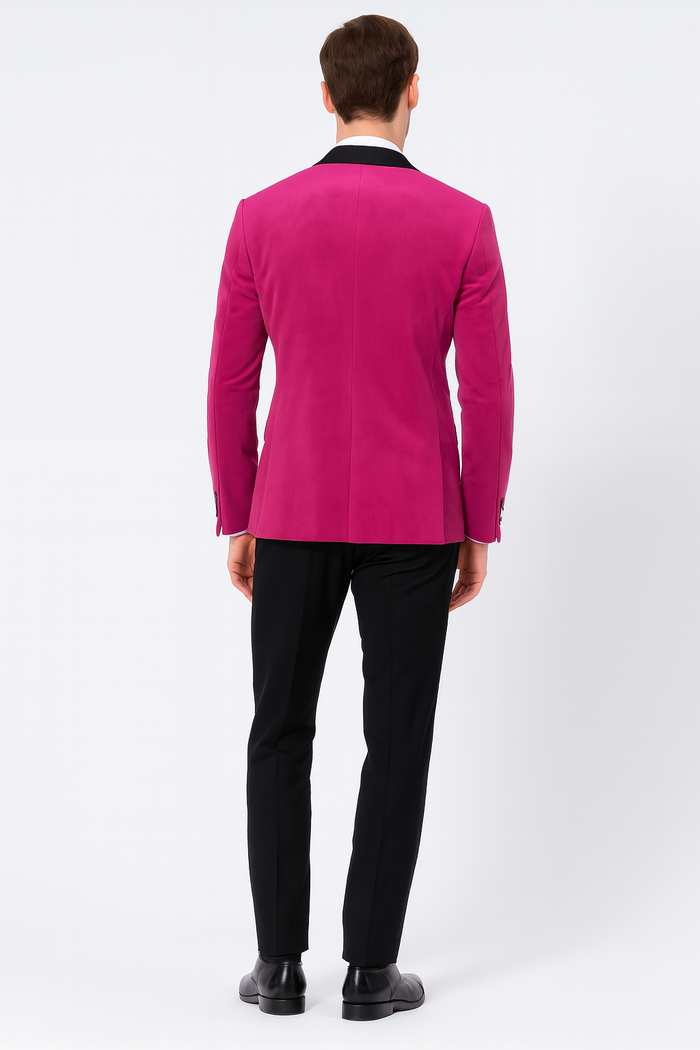 Men's fuchsia tuxedo blazer with black satin lapel, slim fit, and structured back. Paired with black pants. Long sleeves.
