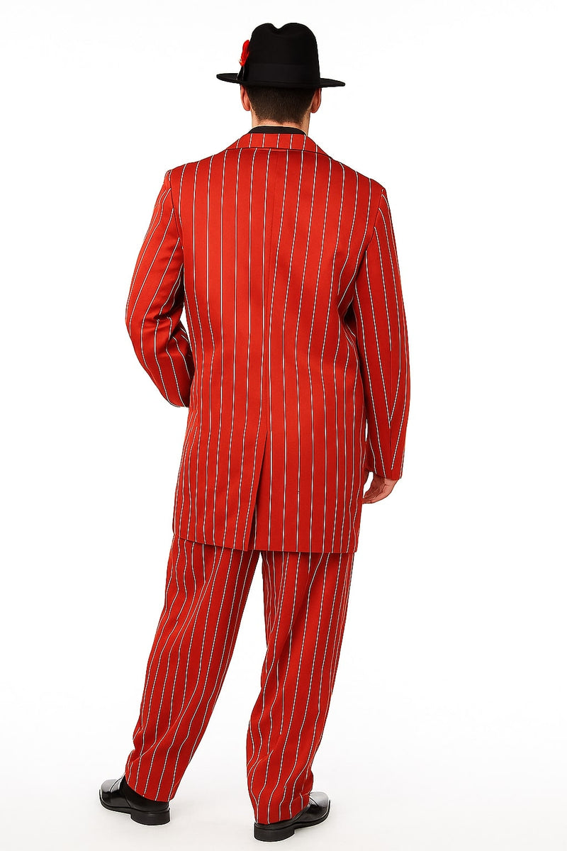 Red pinstripe zoot suit: long, fitted jacket with wide lapels. Loose-fit trousers. Bold red fabric with white pinstripes. Center vent. Black flat shoes complete the look.
