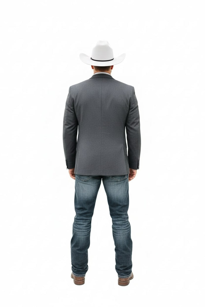 Gray western blazer with tailored fit, two-button closure, and notched lapels. Textured fabric offers a rugged yet formal look. Paired with blue jeans and brown boots for a classic cowboy style.
