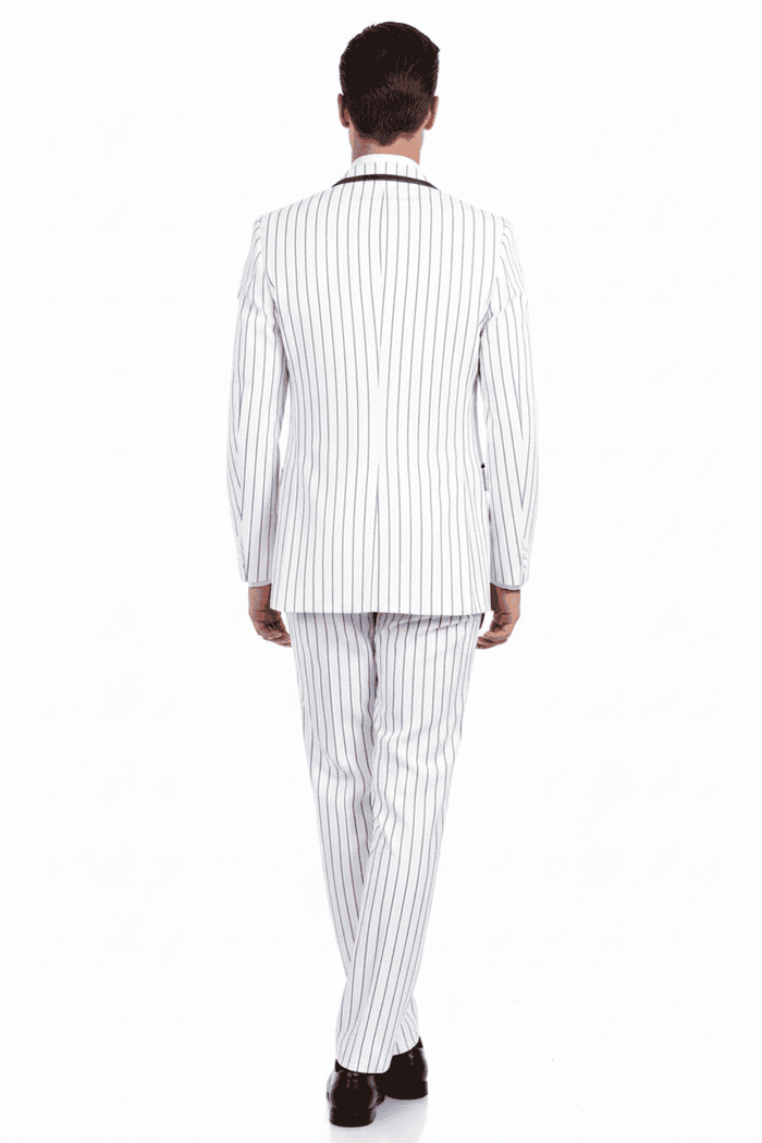 Men's 3-piece white suit with royal blue pinstripes. Classic fit blazer, vest, and slim-fit pants. Smooth fabric. Includes a matching royal blue tie. Uniform color and pattern.