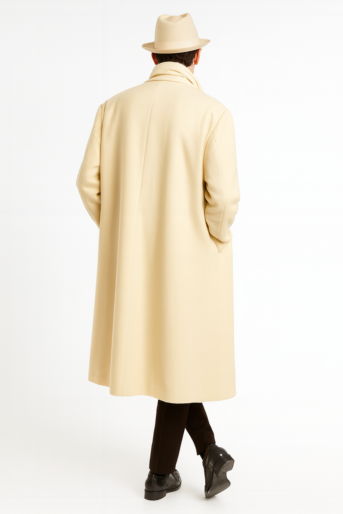 Men's ivory off-white wool overcoat. Full-length, straight silhouette. Cream color, no patterns.
