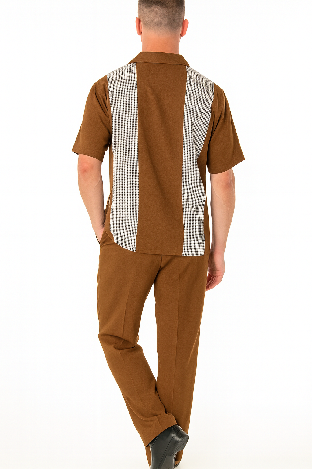 Men's cognac tan two-piece outfit: short-sleeve button-up shirt & pants. Shirt has patterned back panels. Pants are straight-fit with a smooth texture.
