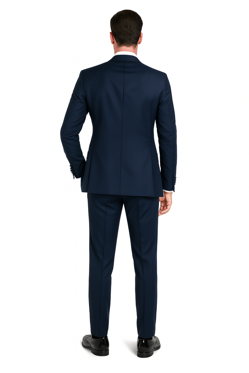 Navy blue men's tuxedo with satin peak lapel. Includes vest, pants & bow tie in navy sateen. A classic three-piece formal suit.
