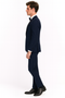 Navy blue men's tuxedo with satin peak lapel. Two-piece formal suit: fitted jacket (single-button) and matching trousers. Classic, elegant design.
