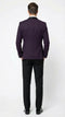 Men's eggplant purple tuxedo blazer with tailored fit, satin lapel, and textured fabric. Single vent back. Paired with black trousers.
