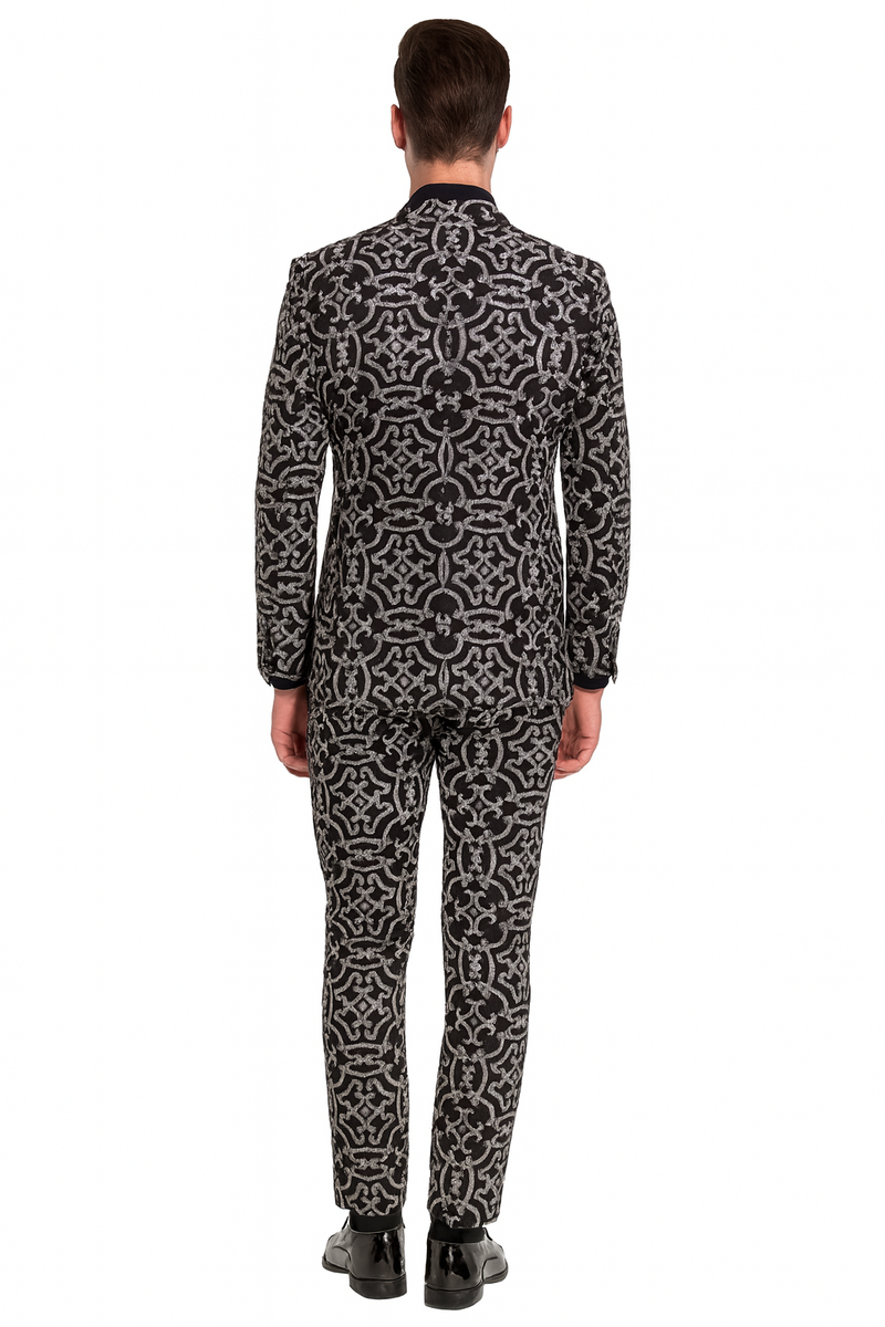 Men's black sequin tuxedo with fitted blazer and trousers. Features silver sequin pattern on black fabric.
