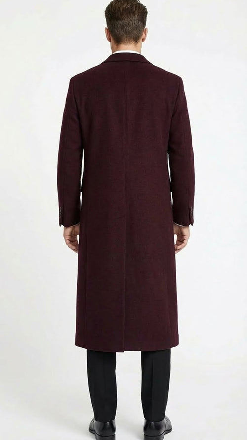 Men's burgundy long coat. Classic fit, wool blend. Straight back, mid-calf length, tailored appearance. Long sleeves, single back vent. Solid burgundy color.
