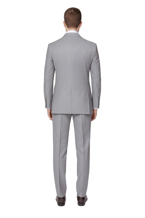 Men's light grey double-breasted suit. Structured fit, straight cut with two-row button closure and matching trousers. Smooth, subtly textured fabric. Clean back, tailored waist. Uniform light grey color.
