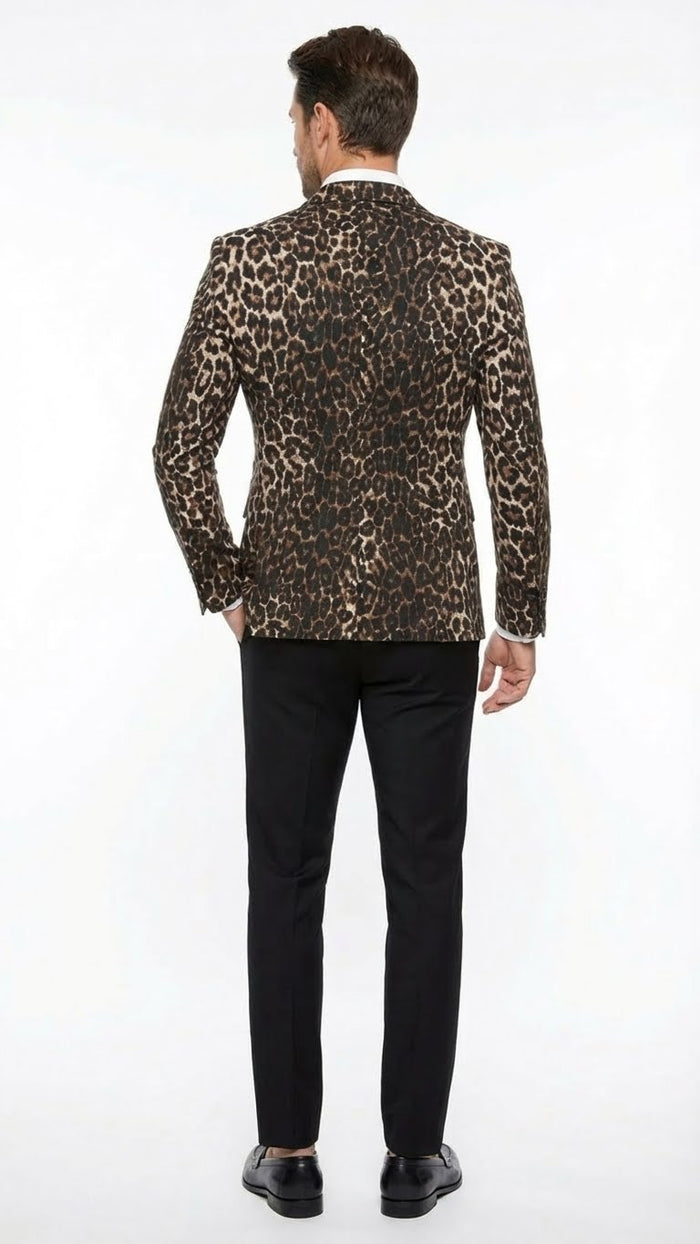 Alberto Nardoni men's leopard print blazer. Fitted, single-breasted with peaked lapels. Brown and black spotted pattern. Tailored waist fit, hip length, long sleeves with buttoned cuffs. Pattern consistent on back.
