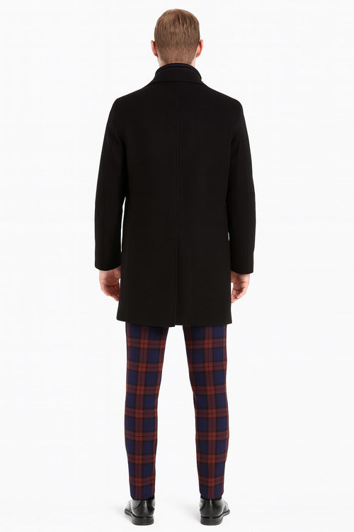 Men's black wool overcoat: classic single-breasted, high collar, clean back seam. Straight-cut silhouette. A timeless, versatile design.
