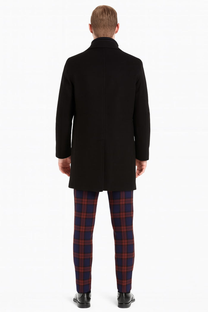 Men's black wool overcoat: classic single-breasted, high collar, clean back seam. Straight-cut silhouette. A timeless, versatile design.
