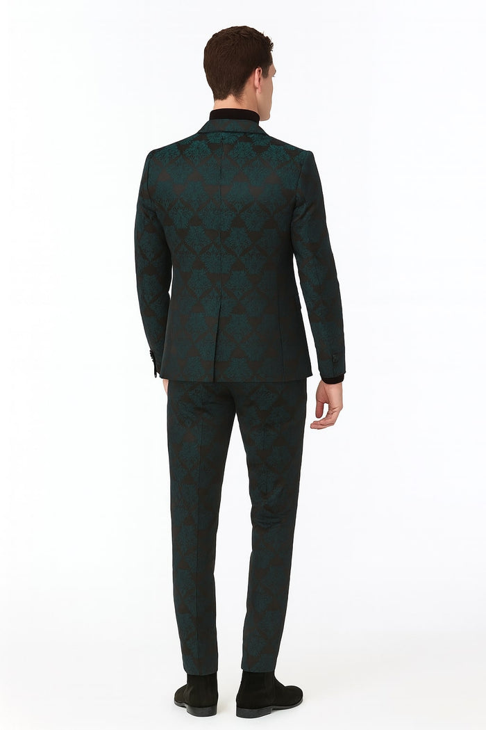 Men's emerald green floral jacquard 3-piece tuxedo. Fitted blazer (single vent, peaked lapels, black buttons), slim-fit trousers, and matching waistcoat. Dark green floral jacquard fabric with black undertones.