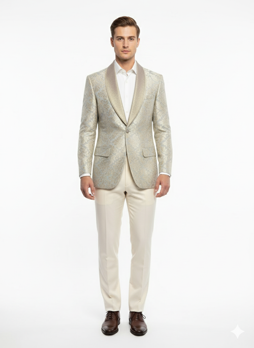 Men's luxury light tan blazer with champagne silver floral embroidery. Shawl collar, two front pockets, and a tailored fit for a sophisticated look.
