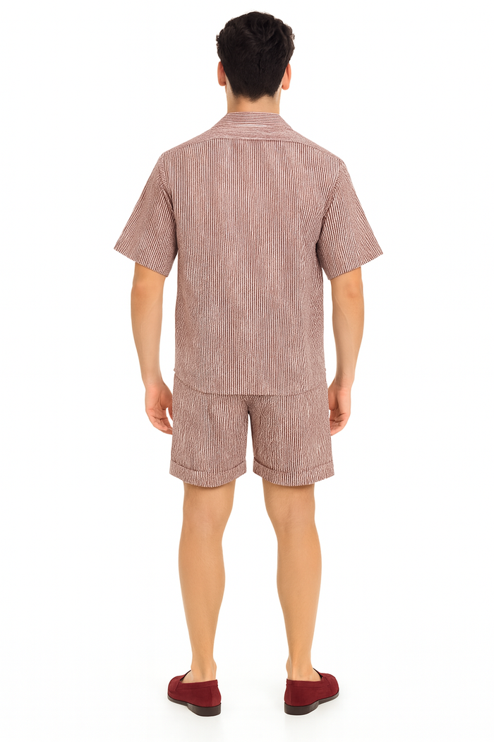 Men's burgundy seersucker short set. Reddish striped, collared short-sleeve shirt & matching shorts. Lightweight, textured fabric perfect for warm weather.
