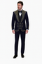 Navy tuxedo for men with gold embroidery on collar/front. Smooth fabric. Includes tailored trousers. Elegant and refined design.
