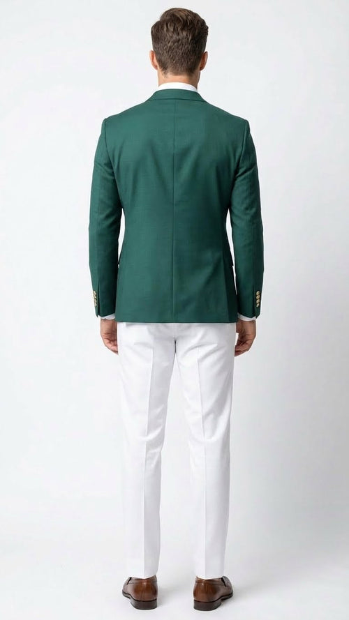 Men’s dark green double-breasted blazer features a tailored silhouette with structured shoulders and a straight cut at the back. The fabric appears textured, enhancing its visual depth.