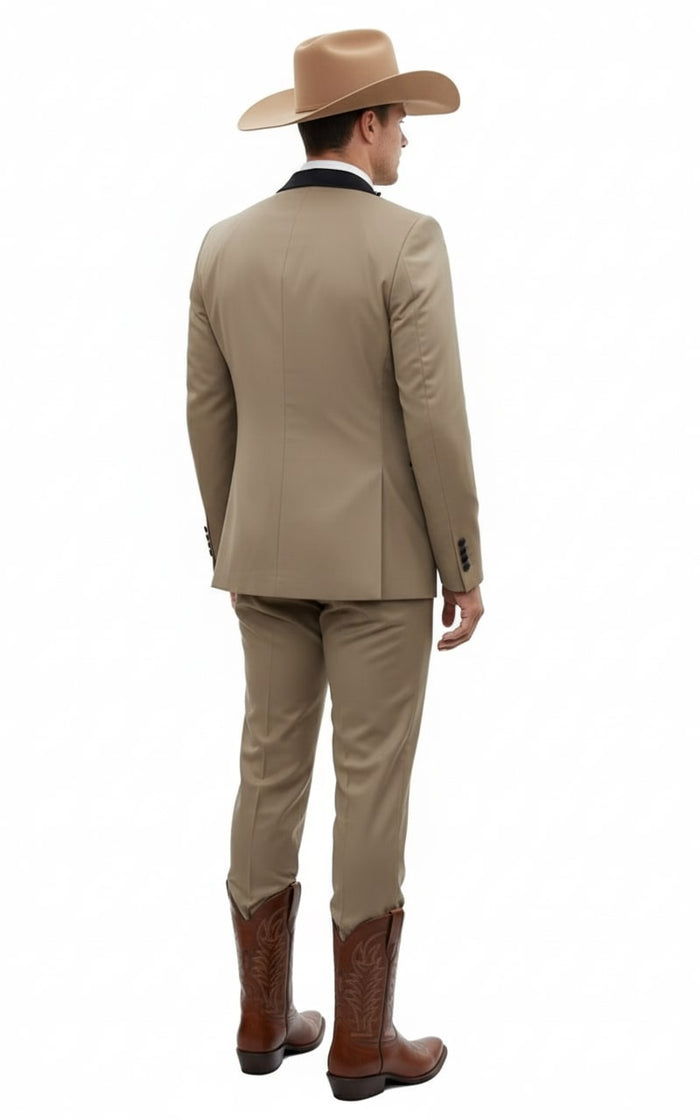Tan tuxedo jacket (black lapel), beige pants, and black vest. Structured fit with clean lines. Includes tan cowboy boots with decorative stitching. Men's western cowboy suit.
