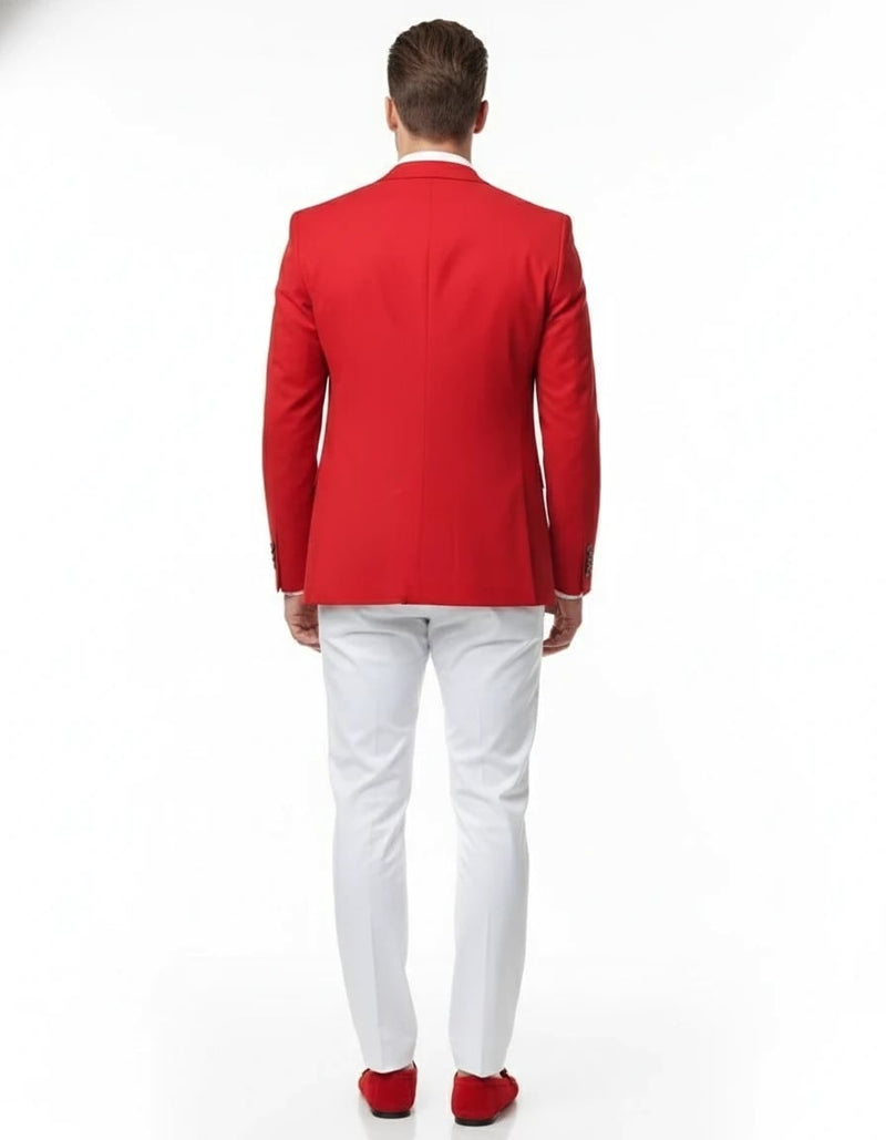 Fitted red blazer and slim white pants outfit. Blazer has a structured silhouette and a smooth back. Matching red footwear completes the look, creating a polished and tailored aesthetic.
